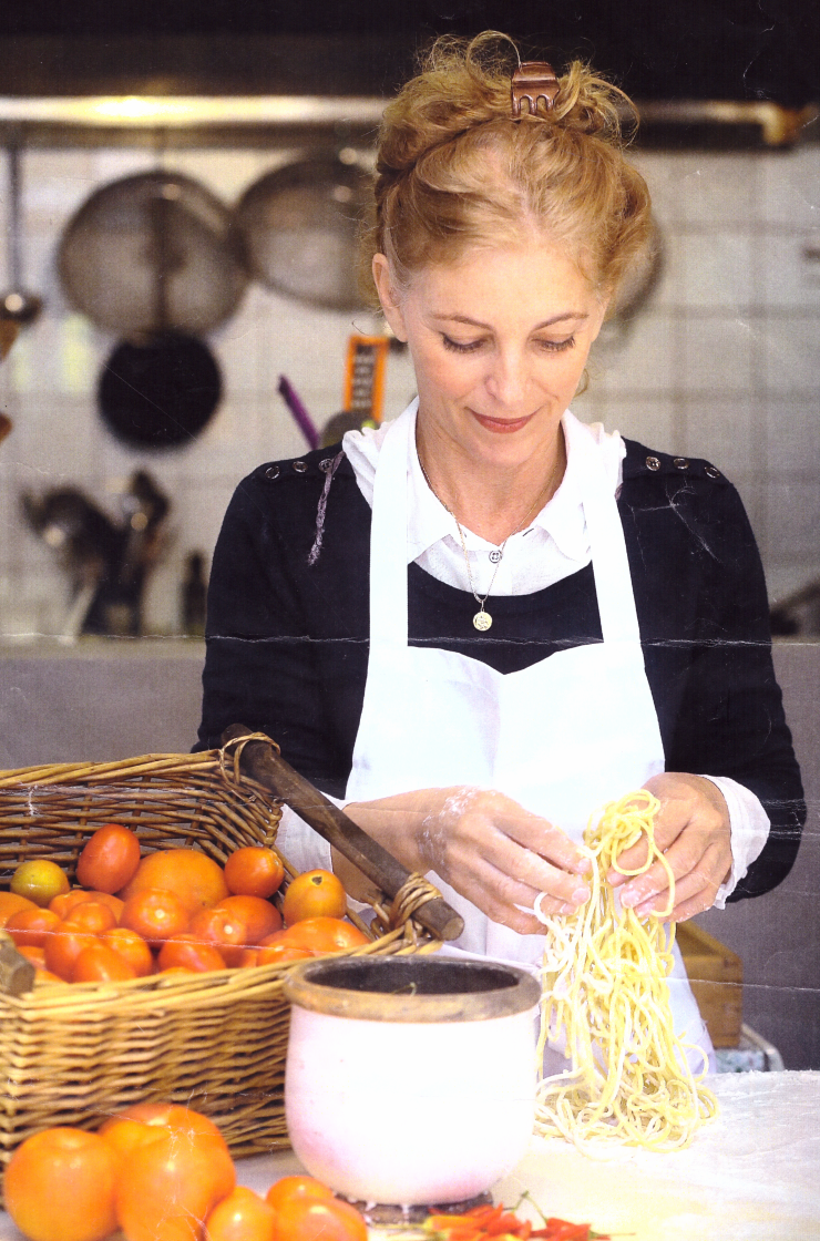 Founder preparing fresh pasta by hand